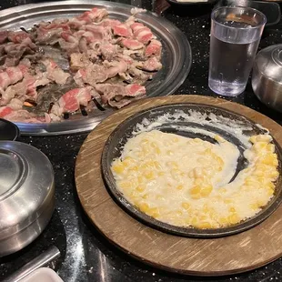 The corn and cheese and brisket on the grill.