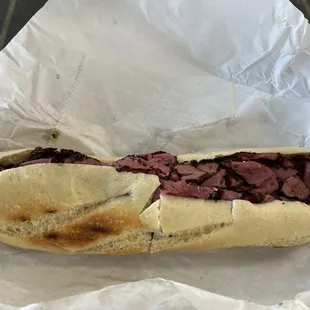 Pastrami &amp; provolone 12&quot; sandwich.