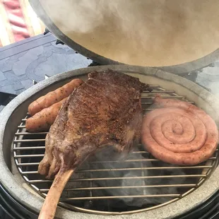 a steak being cooked on a grill