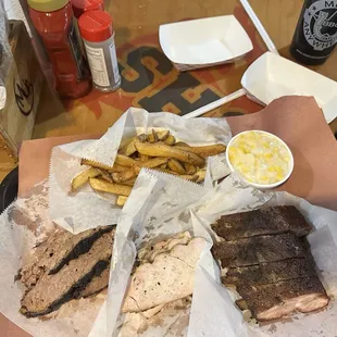 Fatty Brisket, turkey, ribs, creamed corn, fries and coleslaw.