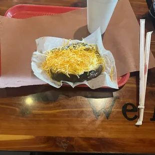 Cold, old baked potato, couldn't melt the Margarine or cheese.