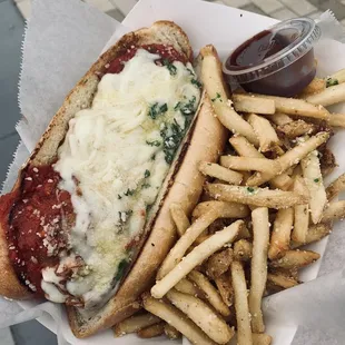 Cheesy meatball sub and garlic parm fries.