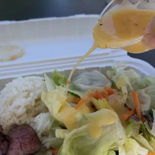 Pouring dressing in the wind...