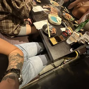 Gap between table and wall after the waiter pulled the entire table out.