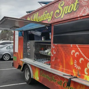 a food truck parked in a parking lot