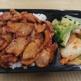 Grilled pork belly with side of kimchi and broccoli