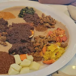 Super veggie combo, doro wat, lamb tibs,  and beef stew