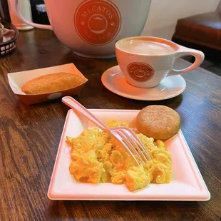 Scrambled Eggs with Small Arepa, Chicken Empanada, Cafe Con Leche