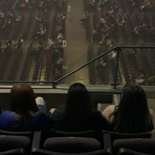 the seats here are cushion they are like velvet but no cup holders or anything just the seat.We got a good view on where we we're sitting.