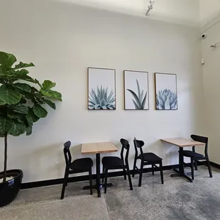 tables and chairs in a coffee shop
