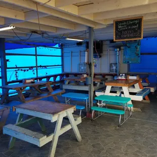 a restaurant with a view of the ocean