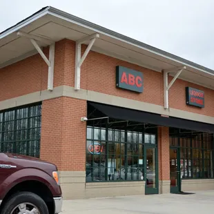 a truck parked in front of the building
