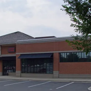 a brick building with awnings
