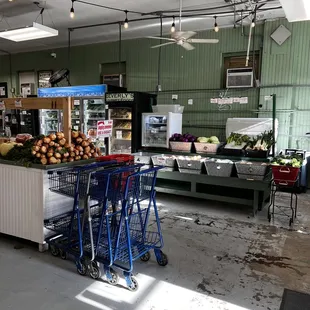 a grocery store filled with produce
