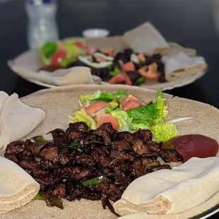 two plates of food on a table