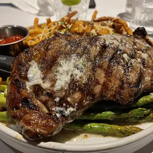Ribeye, truffle fries, and asparagus