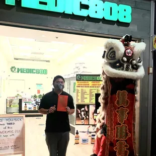 Kung Hei Fat Choy! Rollie and the Dragon.  2 locations at Pearlridge