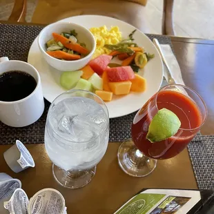 a plate of food and drinks