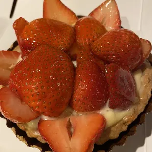 Strawberry fruit tart: custard was watery (not set) and the crust was hard so you have to stab at it to take a piece