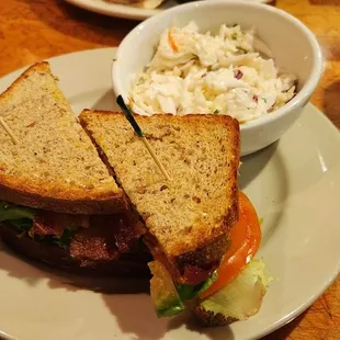 Bacon lettuce avocado tomato sandwich with coleslaw