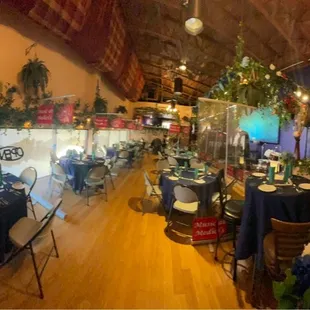 a dining room with tables and chairs