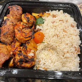 1 skewer beef, 1 Skewer chicken, 3 shrimp, 4 pieces of vegetable and rice (no bread) for $38.00
