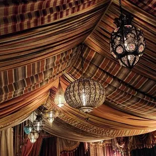 the interior of a moroccan style room