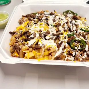 Chilli tri tip fries, don't forget the avacado sauce!