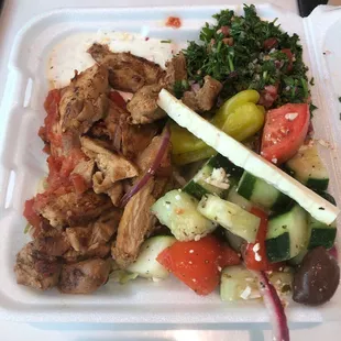 Chicken kebob and Greek salad and tabbouleh