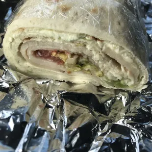 a sandwich wrapped in foil