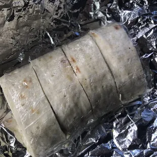 a burrito wrapped in foil