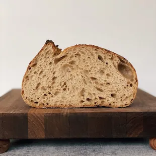 a loaf of bread on a cutting board
