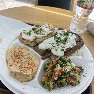 Combo meal-Shesh Lek- with tawook chicken and the gyro meat with hummus and tabouli