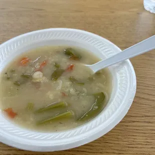 lentil soup brought to table by owner, complimentary