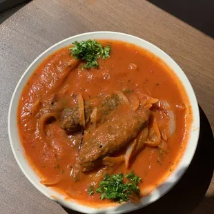 Kefta with tomato sauce served with rice
