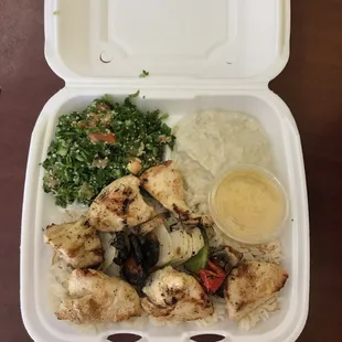 Chicken Kabob entree with Tabbouleh and Baba Ghanouj