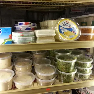 Unmarked and unpriced (actually $3.99) tubs of hummus, baba ghanoush, tabbouleh, and wickedly hot Turkish salad