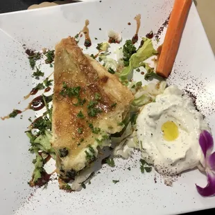 Spinach pastry with an amazing sauce.