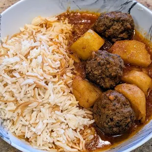 Dawood Basha (Kafta meat balls in tomato sauce with rice and potatoes) stew. A daily special.
