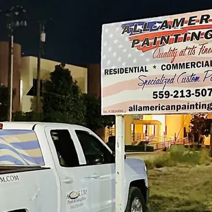 a truck parked in front of a restaurant