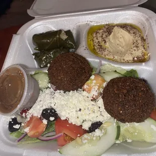 Veggie Falafel Platter with Stuffed Grape Leaves, Hummus, and Greek Salad