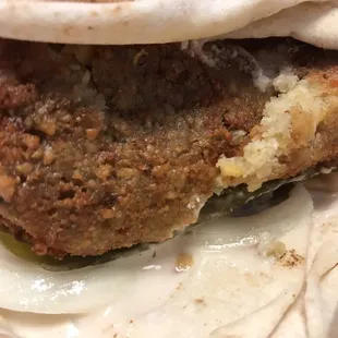 Falafel sandwich in pita bread. Very good with added hot sauce.