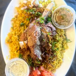 a plate of meat and rice