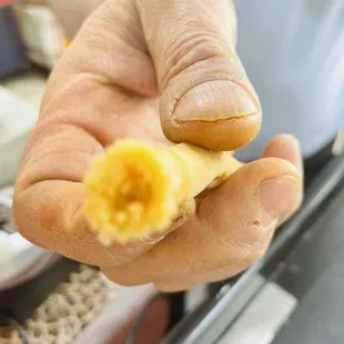 a man holding a banana in his hand