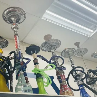 a variety of hook - ons on a shelf