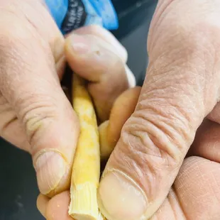 a person peeling a banana