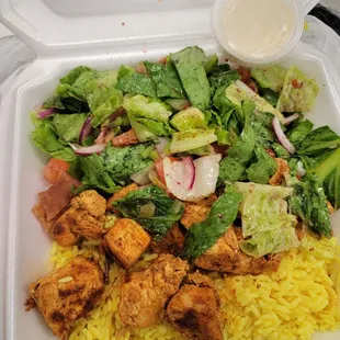 Chicken, rice, and fatoush salad was really good very flavorful. I love that garlic sauce