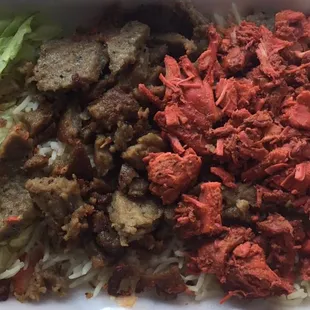 Chicken and Lamb over rice with sauce on the side.