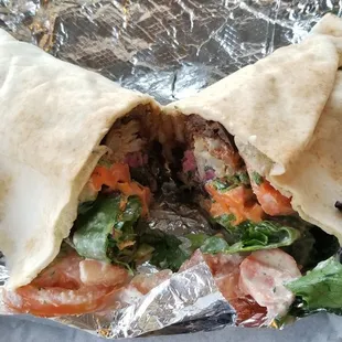 Bantinjan wrap - Marinated eggplant, fried cauliflower, potatoes, lettuce, tomatoes, fries, carrots (too hard), special sauce