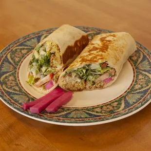 a tortilla sandwich on a plate
